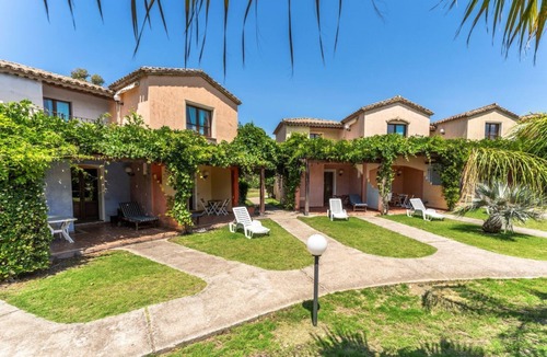 Santa Margherita di Pula Apartment | Two-room premium apartment 4 beds (38 mq): living room with kitchenette, fridge, microwave, dishwasher, double sofa bed, double bedroom (beds can be separated), bathroom. They can be on the ground floor with a patio or on the 1st floor with a balcony,