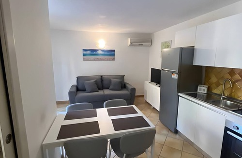 Baia Caddinas House | Vacation Home "Residence Orizzonti App N 3" with Private Terrace & A/C