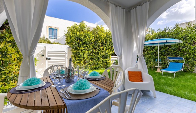 Apartment 'D R Holiday Home' with Private Garden close to the sea in Santa Maria del Focallo