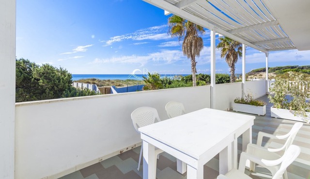 Apartments in residence in Punta Prosciutto with direct access to sandy beach