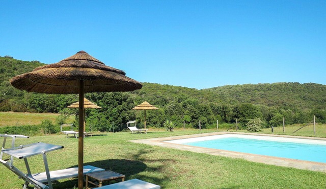 Beautiful apartment in villa for 2 guests with pool, WIFI, TV and patio in Roccastrada