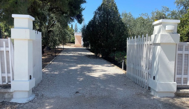 Cozy guest house on private olive orchard estate surounded by fruit trees.