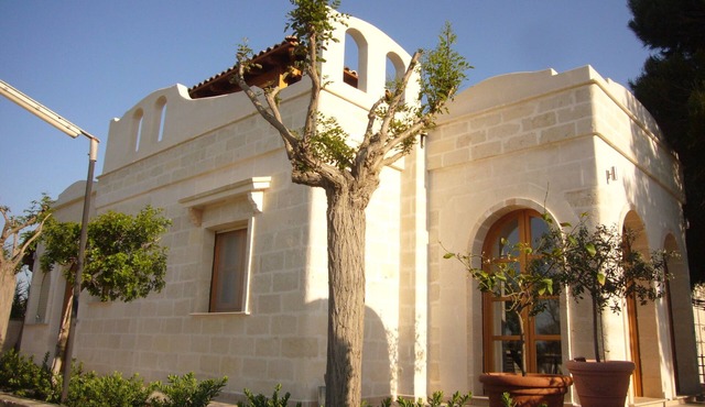 Exclusive holiday villa between dunes, vines and olive trees