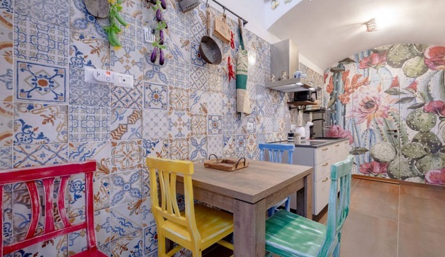 GuestHost - Charming 74 sqm apartment, ideal for groups or families of up to 4 guests, located on the first floor of a building (a few steps to access/NO elevator).The accommodation is located in a very central area, just a few minutes’ walk from the