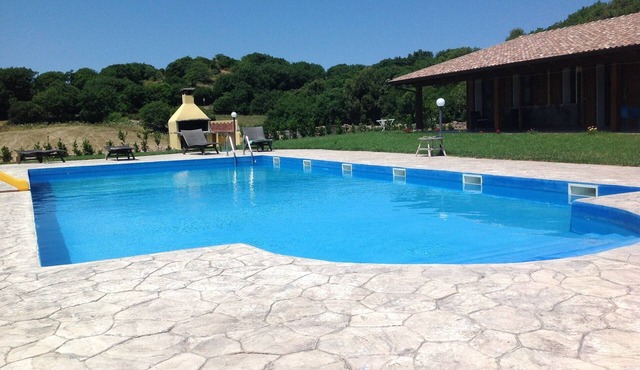 Holiday Home 'Farm Holiday Sa Raighina - Right' with Shared Pool, Wi-Fi and Air Conditioning in Nulvi