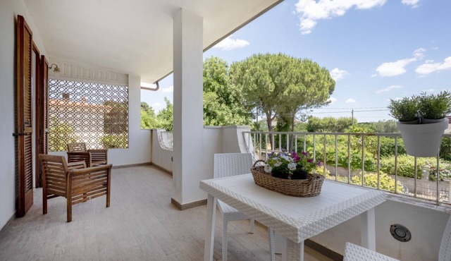 Large studio apartment perfect for two people, is located in a shared villa but has its own private access. It features a shared garden and a large furnished patio for exclusive use. The accommodation is located in Marina di Pulsano, a well-served seasid