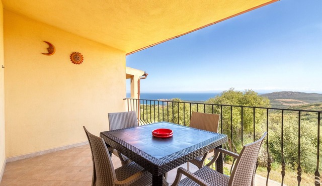 Sea View Isola Rossa Apartment with Sea View, Wi-Fi, and Air Conditioning