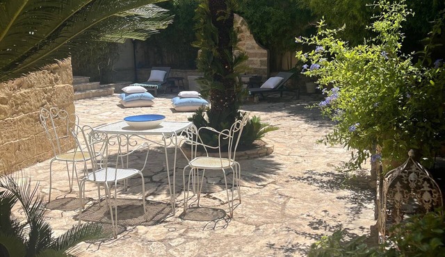 Suite Basium in 1918 Liberty-Style Palazzo with Garden, Outdoor Tub, and Wi-Fi