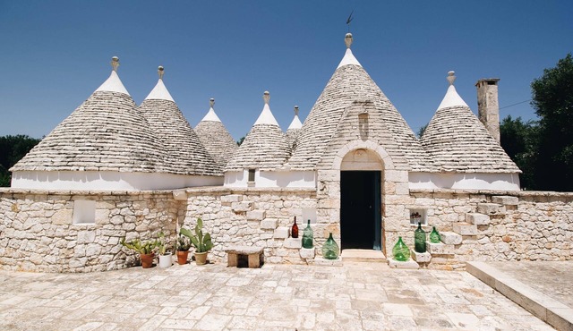 Traditional trullo with swimming pool