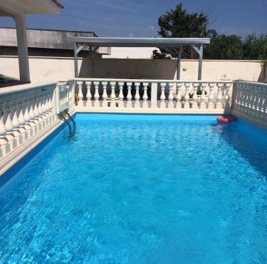 Villa with pool in Punta Prosciutto, 120 m², play area