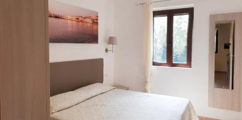 Chiesiola Apartment | Charming apartment in Vieste with shared pool - 35 m²